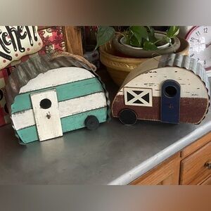 Distressed wood and metal camper birdhouses. Wooden house with metal roof.